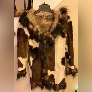 Cow print fur coat. Reversible to distressed suede